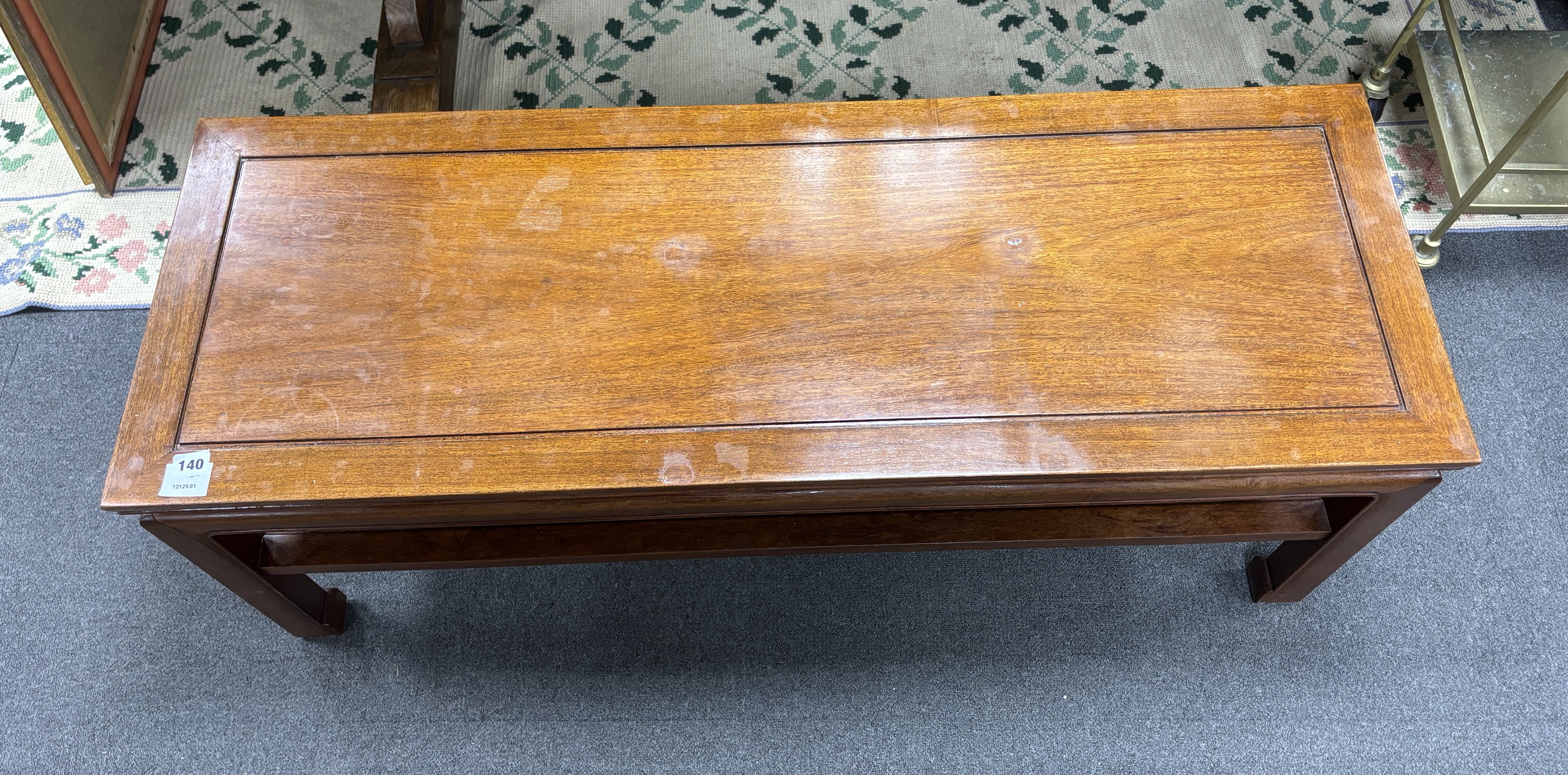 A Chinese rectangular hardwood two tier coffee table, width 122cm, depth 43cm, height 46cm